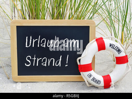 Urlaub am Strand - Willkommen Stockfoto