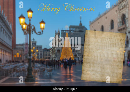 Weihnachten Grußkarten mit verschwommenen Hintergrund auf die Piazza San Marco in Venedig Stockfoto