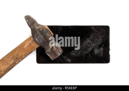 Einen alten Hammer und Smartphone Stockfoto