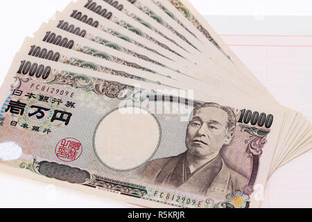 Japanische Geld und Sparbuch auf weißem backgroundã € € isoliert Stockfoto