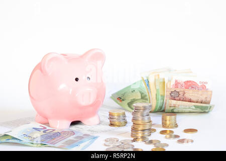 Speichern im sparschwein Stockfoto