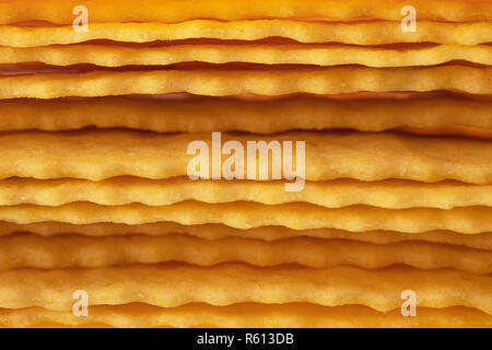 Käse, Cracker frisch gebackene als Textur Hintergrund. Stockfoto