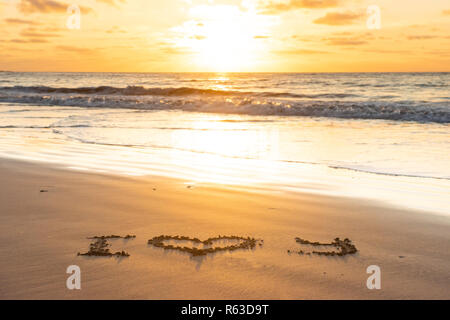 Ich liebe Dich auf Sand Strand Stockfoto