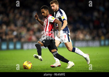 Die Brentford Rico Heinrich (links) und West Bromwich Albion ist James Morrison Schlacht für die Kugel während des Skybet Championship Match in West Bromwich, West Bromwich. Stockfoto