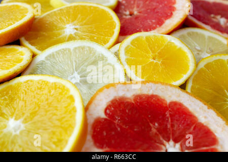 Orange Grapefruit und Zitrone schneiden Stockfoto