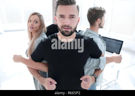 Hand halten zusammen im Team für den Erfolg etwas oder kümmern. Stockfoto