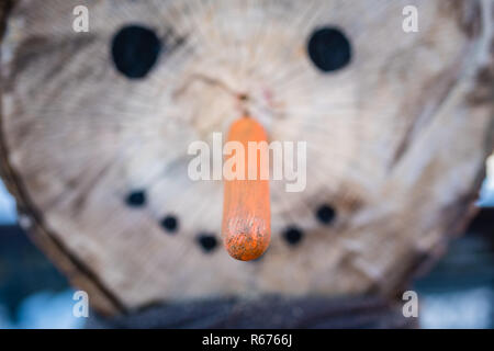 Holz schneemann Gesicht Stockfoto