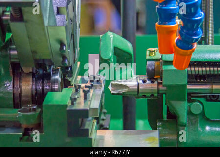 Schraube einfädeln Maschine grün Stockfoto