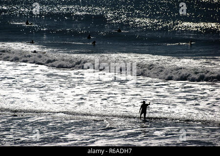 Surfer-Silhouetten Stockfoto