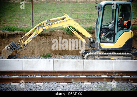 Bagger bei Railway Works Stockfoto