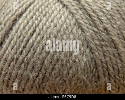 Wolle Knäuel Thema Handwerk grauer Hintergrund Textur Fibre Makro Stockfoto
