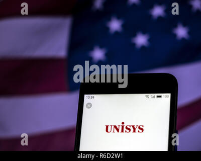 Kiew, Ukraine. 4. Dez, 2018. Unisys Information Technology Company Logo auf dem Smartphone angezeigt. Quelle: Igor Golovniov/SOPA Images/ZUMA Draht/Alamy leben Nachrichten Stockfoto