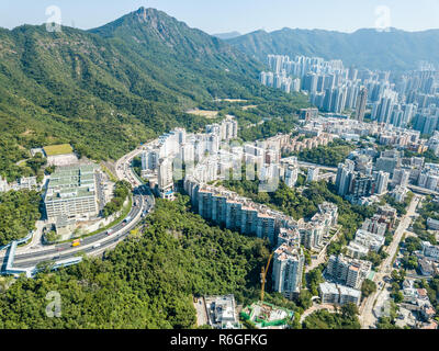 Lion Rock Mountain und Baustein in Hong Kong City Stockfoto