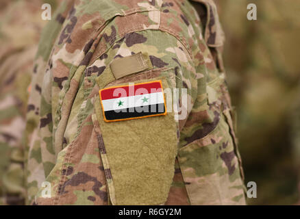 Flagge Syrien auf Soldaten arm (Collage). Stockfoto