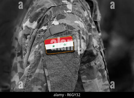 Flagge Syrien auf Soldaten arm (Collage). Stockfoto