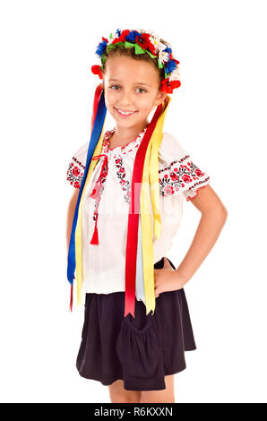 Kleines Mädchen in traditionellen ukrainischen Kleid auf Weiß isoliert Stockfoto