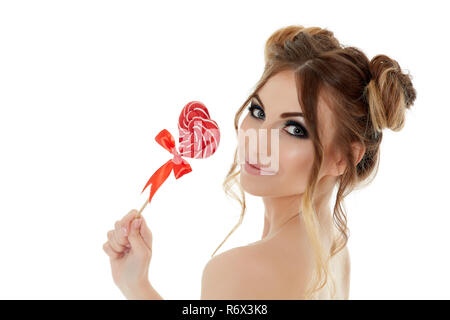 Junge Frau mit Lolli. Stockfoto