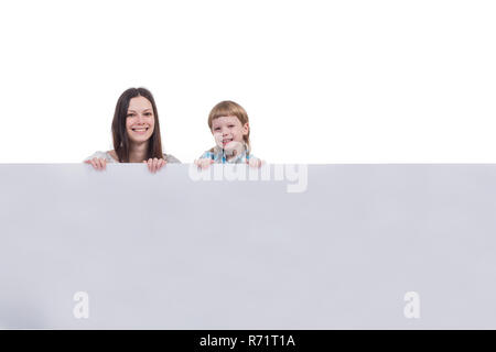 Schöne Frau mit einem Jungen mit einem Schild auf weißem Hintergrund Stockfoto