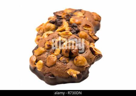 Köstliche artisan Schokolade und Mandeln Cookies auf weißem Hintergrund Stockfoto