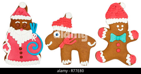 Weihnachtsmarkt Lebkuchen Weihnachtsmann mit Rentier Elch Elch zahlen essen Cookie auf weißem Hintergrund Stockfoto