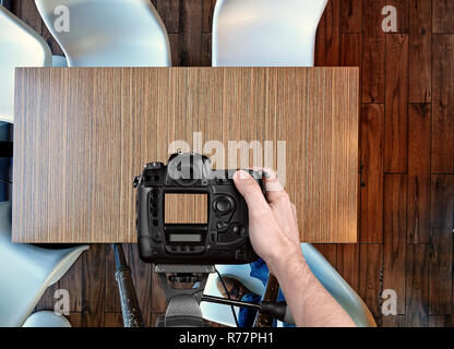 Fotograf Fotos von oben auf leere Holztisch Stockfoto