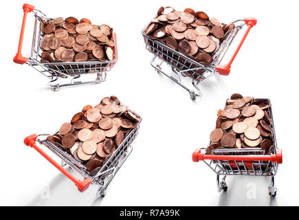 Münzen in Warenkorb Stockfoto