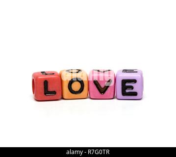 Liebe - Wort aus bunten Kind Spielzeug Würfel mit Buchstaben Stockfoto
