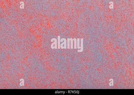 Bau von einem dunkelblauen Hintergrund mit orange Flecken aus Filz, Stoff, Nahaufnahme. Textur der Kammgarn matt Textil. Tuch Kulisse. Stockfoto