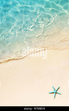 Starfish on the summer beach. Summer background. Tropical sand beach. Stockfoto