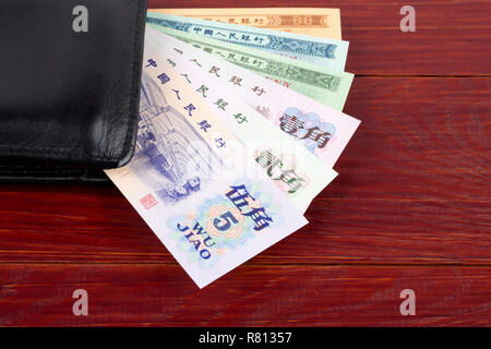 Alte chinesische Geld in der schwarzen Mappe Stockfoto