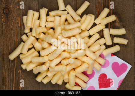 Mais puffs Snack food Textur Hintergrund, bis detail schließen. Stockfoto