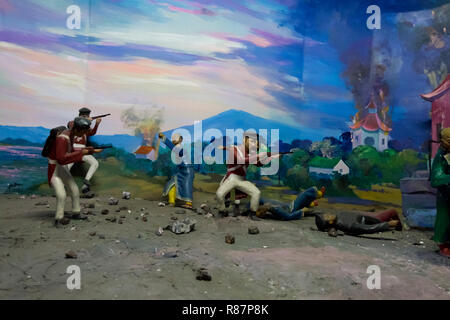 Diorama, das die kolonialen Britischen kämpfen die Einheimischen an der Droge Beseitigung Museum in Yangon, Myanmar. Stockfoto