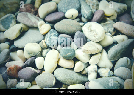 Hintergrund der eine Menge Kies Stockfoto