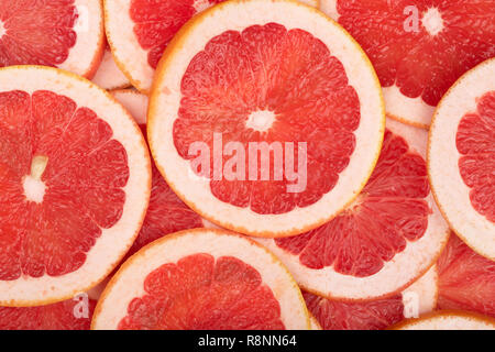 Grapefruit Schichten als Hintergrund. Ansicht von oben. Flach Muster Stockfoto