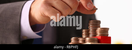 Hand Geschäftsmann, pin Geld Stockfoto