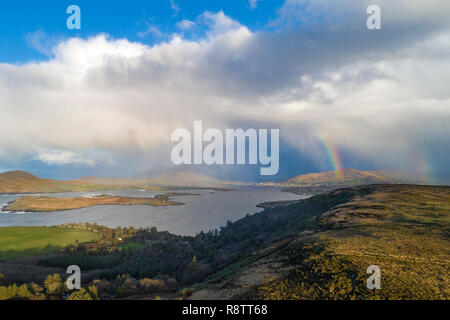 Dramatische Wolken und doppelten Regenbogen, über Valentia Island County Kerry, Irland Stockfoto