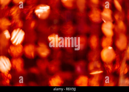 Red bokeh Hintergrund mit Kopie Raum und interessante Muster Stockfoto