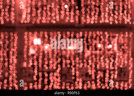 Coral Farbe Muster. Abstrakte verschwommenen Hintergrund mit kleine Lichter. Stockfoto