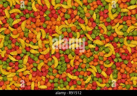 Eine bunte Abstrakt Hintergrund gemischte getrocknete Vogel behandelt, dass Ernährung für pet-Papagei, Vögel aller Größen enthalten. Geeignet für bunte Tapeten. Stockfoto