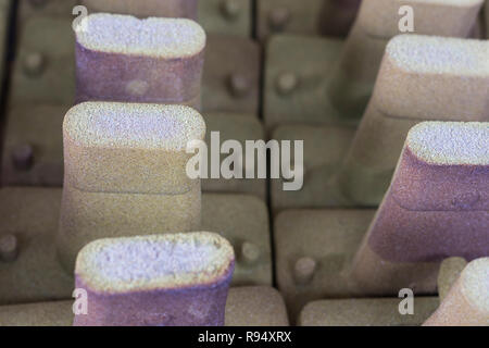 Beschichtet Sand Produkte für Gießen Stockfoto