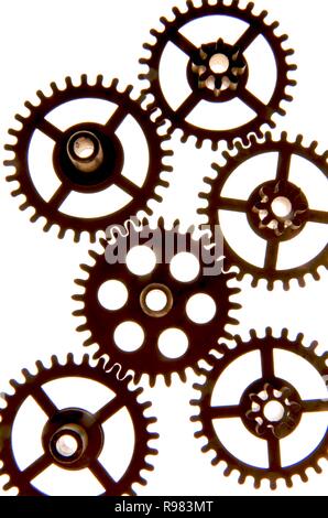 Galoppierte Zahnräder auf einem weißen Hintergrund, Studio shot Stockfoto