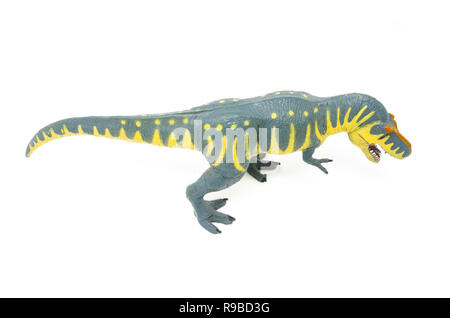 Ansicht von oben gelb blau Battat Tyrannosaurus rex Dinosaurier Spielzeug, auf einem weißen Hintergrund. Stockfoto