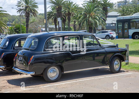 Die schwarzen Londoner Taxis als Braut Hochzeit Auto in Sydney, Australien Stockfoto