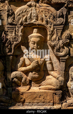 Sandstein bas-relief Schnitzereien in Angkor Thom Terrasse der Elefanten in Siem Reap, Kambodscha. Stockfoto