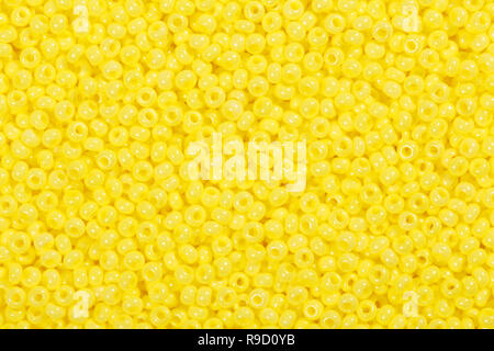 Vielen gelben Glasperlen auf Makro-, Textur. Stockfoto