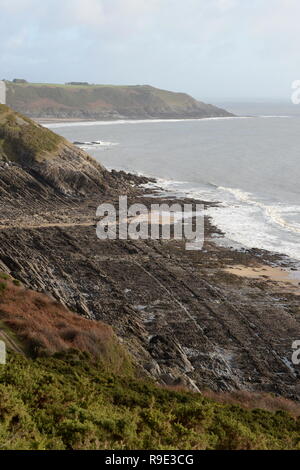 Die Küste der Geologie von pwlldu Bay Caswell Bay ist bei Ebbe offenbart. Halbinsel Gower Coast in South Wales Stockfoto