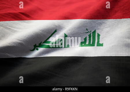 Nahaufnahme von gekräuselten Irak Flagge Irak Flagge weht im Wind Stockfoto
