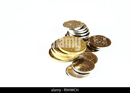 Geldmünzen stapelten sich auf einer glänzenden Oberfläche keine Menschen Stock Foto Stockfoto