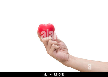 Rotes Herz Kugel: Druckhelfer foam ball Die rote Herz Form auf Frau hand auf weißem Hintergrund mit Freistellungspfad isoliert Stockfoto