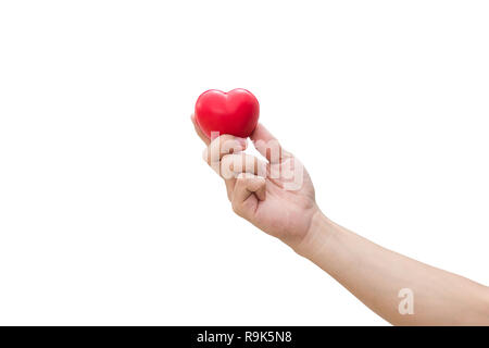 Rotes Herz Kugel: Druckhelfer foam ball Die rote Herz Form auf Frau hand auf weißem Hintergrund mit Freistellungspfad isoliert Stockfoto